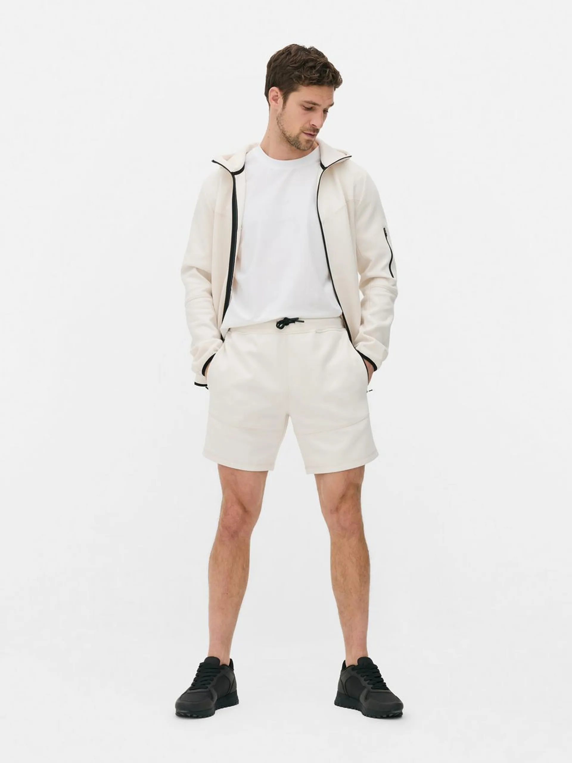 Drawstring sports shorts with side zip pockets