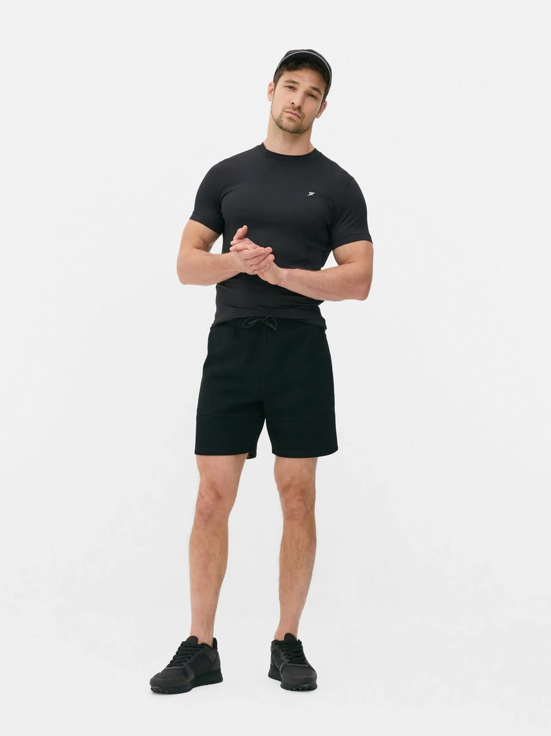 Drawstring sports shorts with side zip pockets