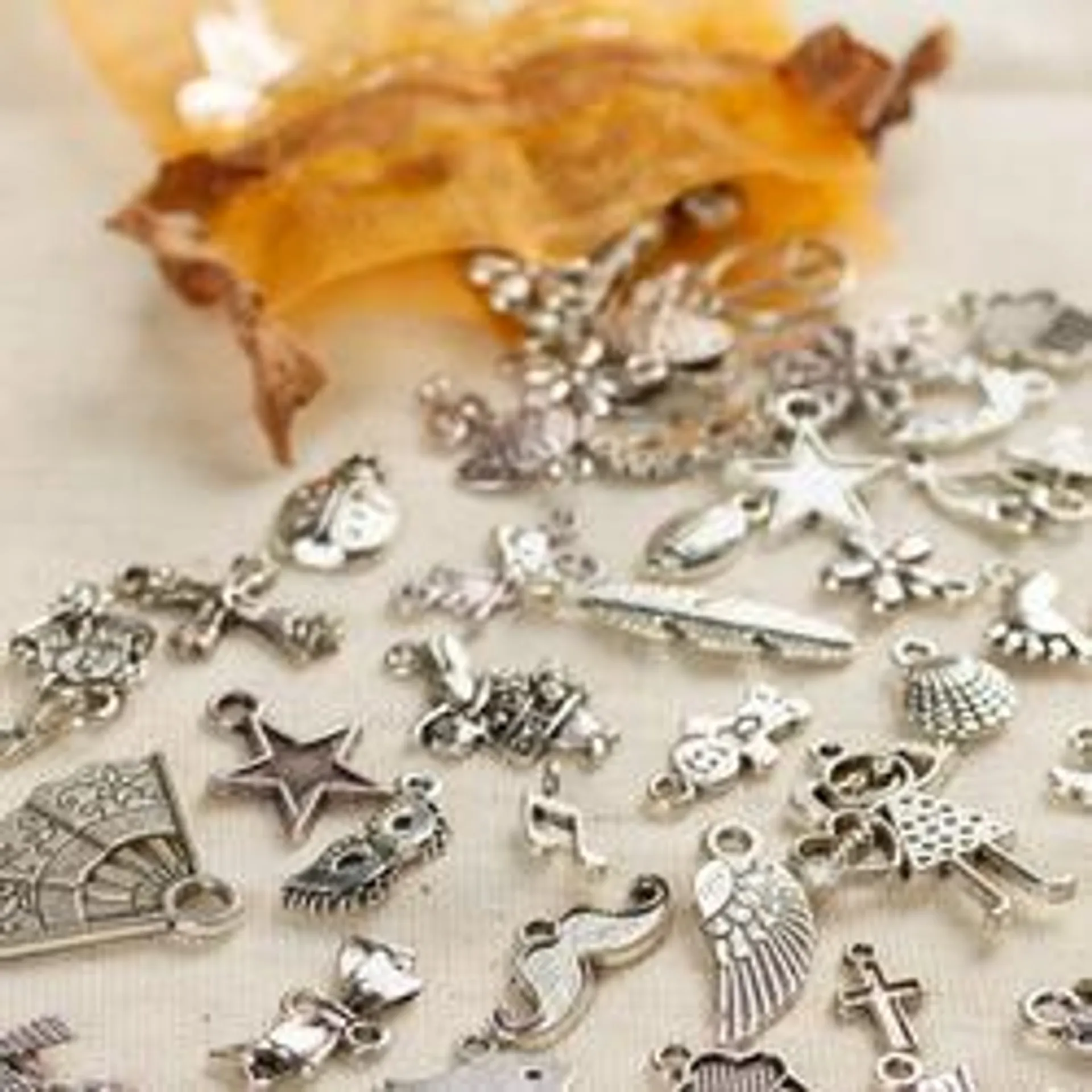 Bag of Silver Charms (Package of 100 pieces)