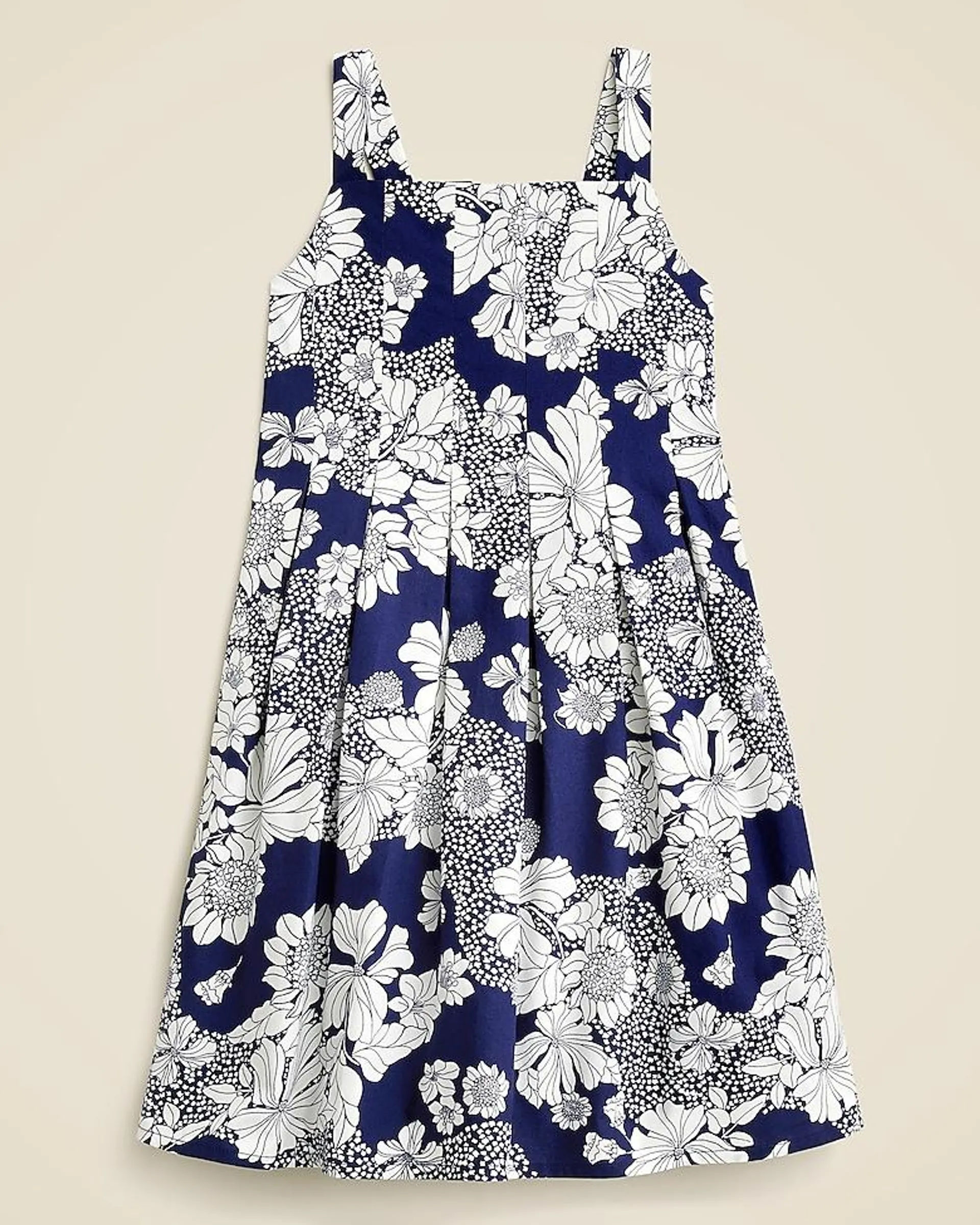 Girls' pleated apron dress in indigo floral