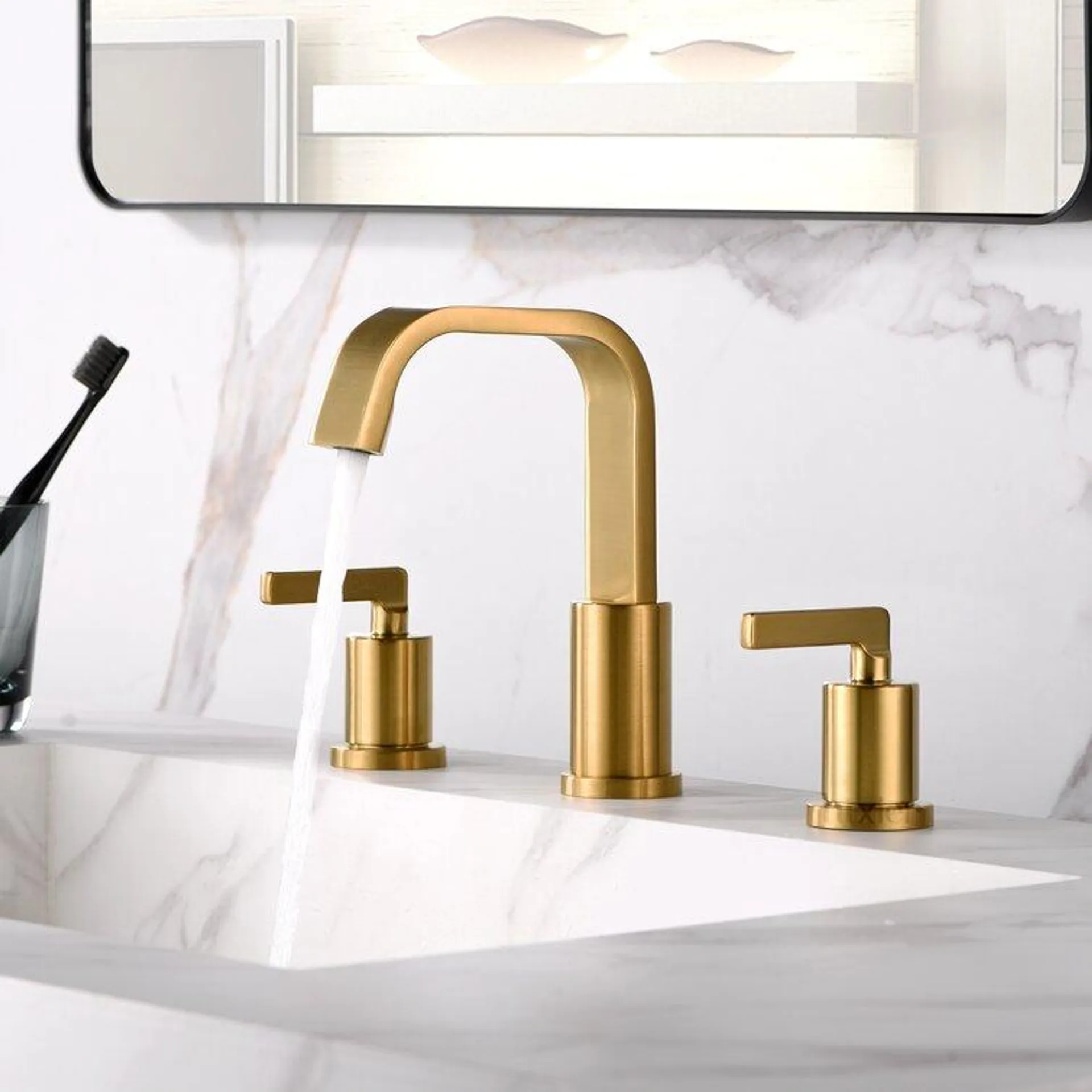 Widespread Bathroom Faucet with Drain Assembly