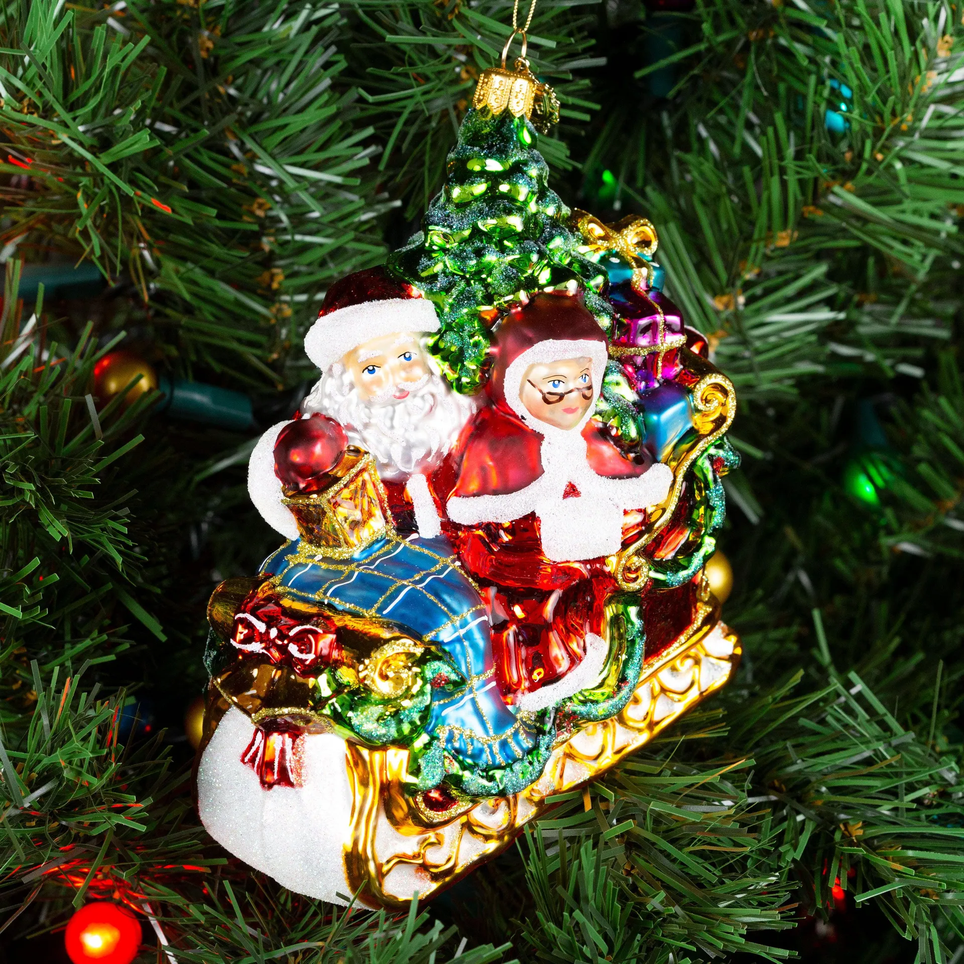 Pier 1 Santa and Mrs Claus on a Sleigh Ride Glass Christmas Ornament
