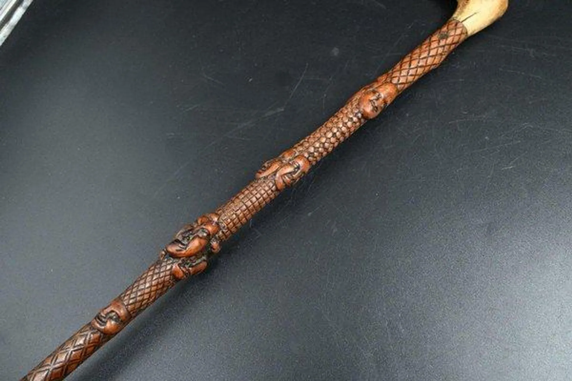 Carved Boxwood Cane with Multiple Faces