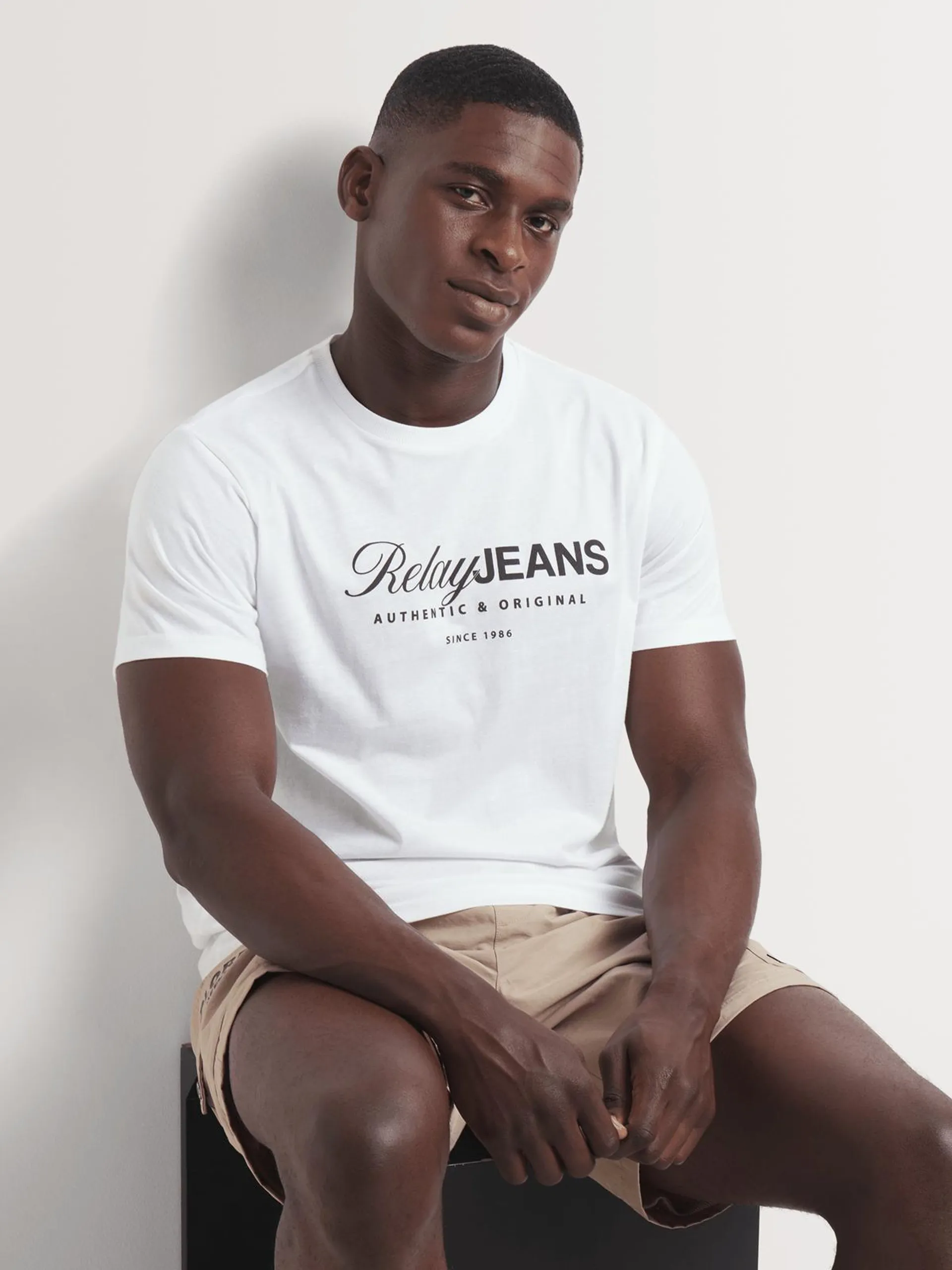 Men's Relay Jeans Signature Branded White Graphic T-Shirt